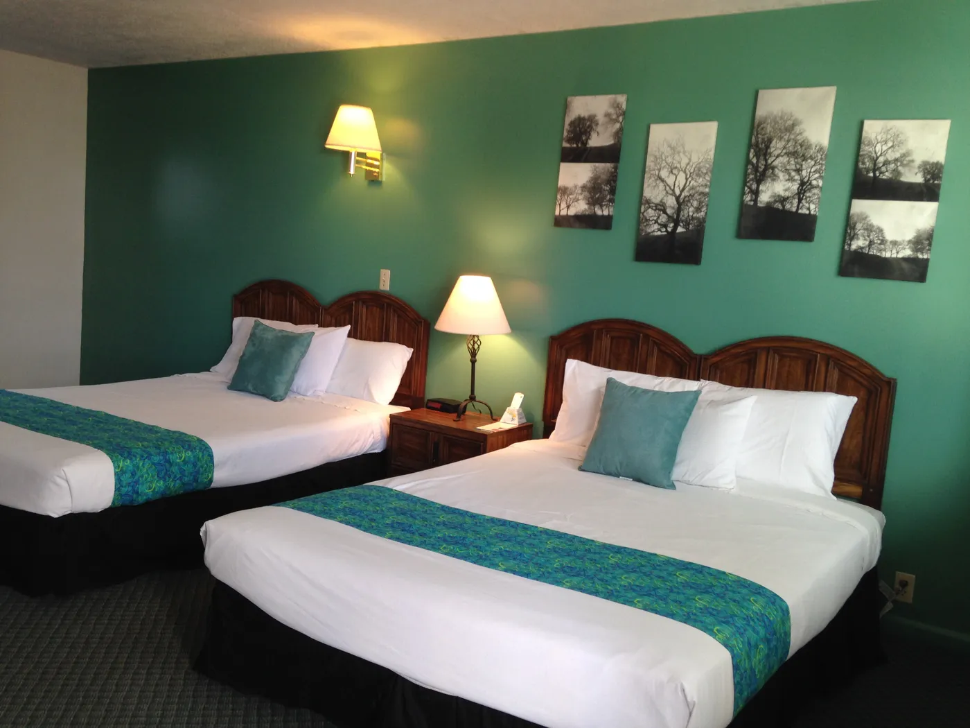 Clean guest room with two comfortable beds